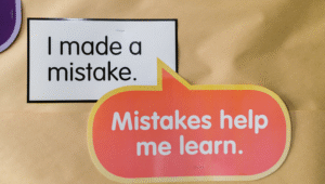 Motivational poster encouraging spoken English learners to embrace mistakes as part of learning.