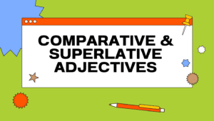 Slide titled "Comparative & Superlative Adjectives" with colorful decorations including stars, a pencil, and push pins.