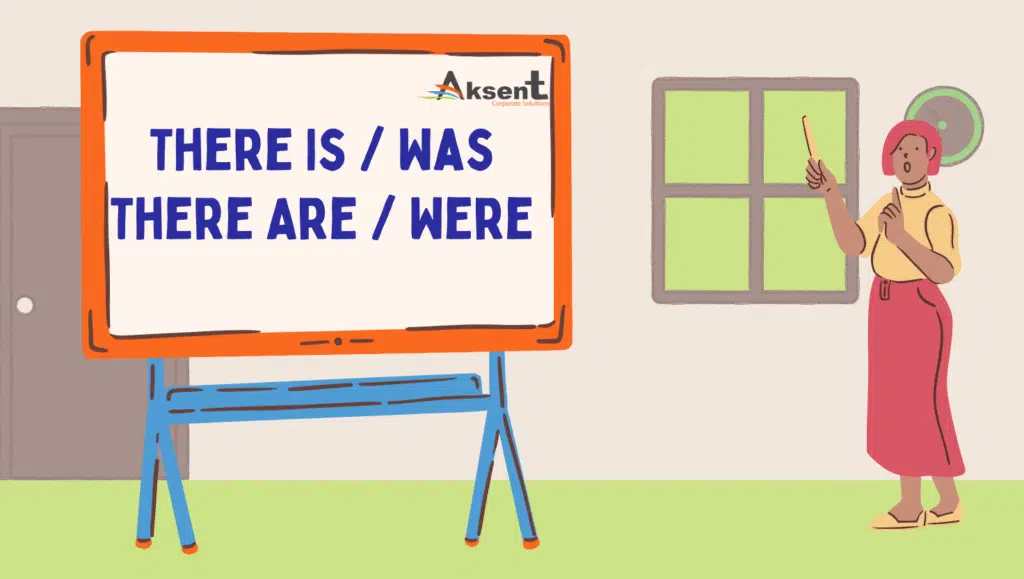 Teacher explaining “There is / There are / There was / There were” grammar on a board – simple English grammar for beginners.
