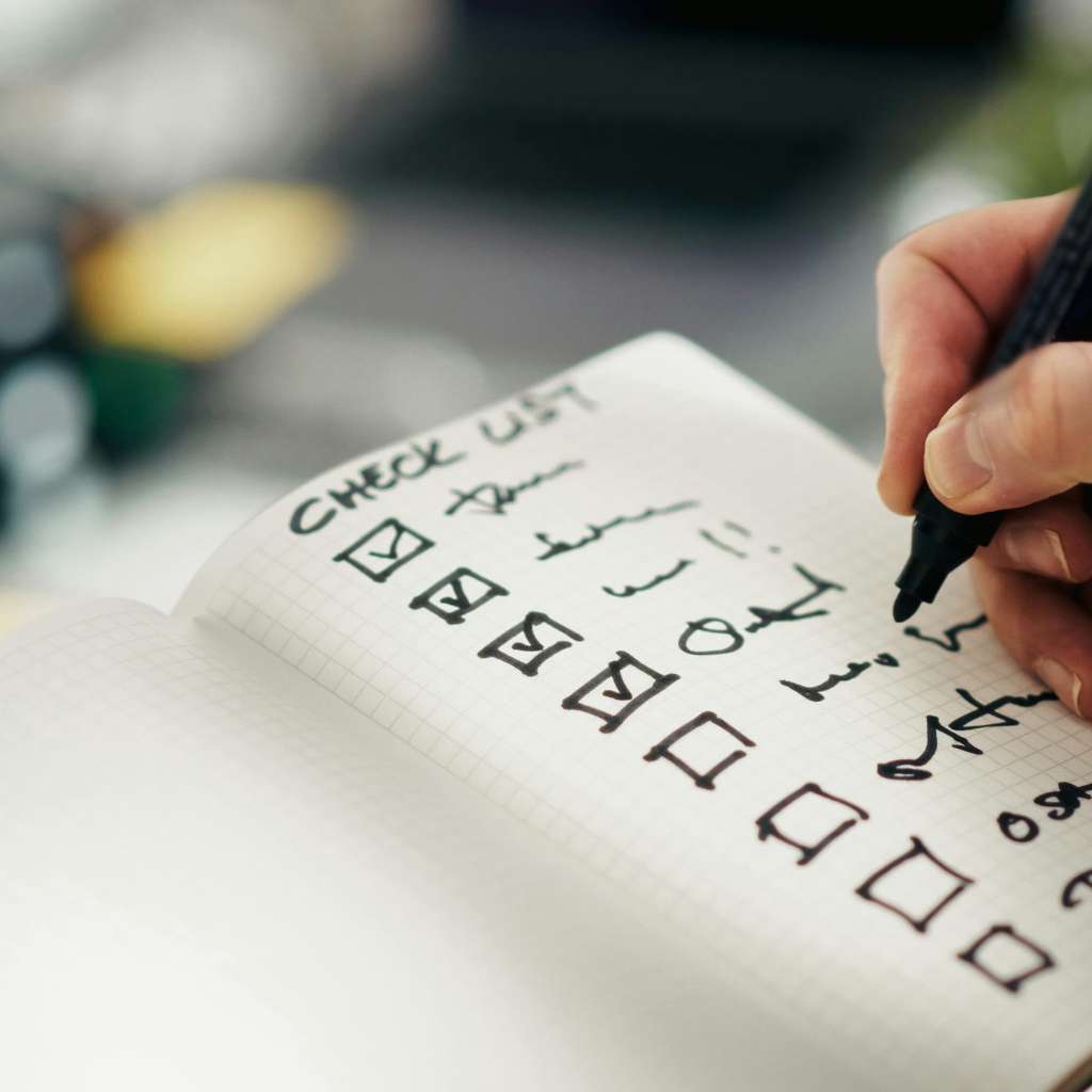 Student tracking English learning progress in a study journal